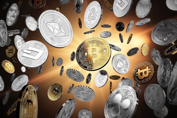 Stack of gold crypto coins with a globe overlay